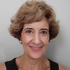 A small image of Linda Zinowski smiling in a headshot portrait