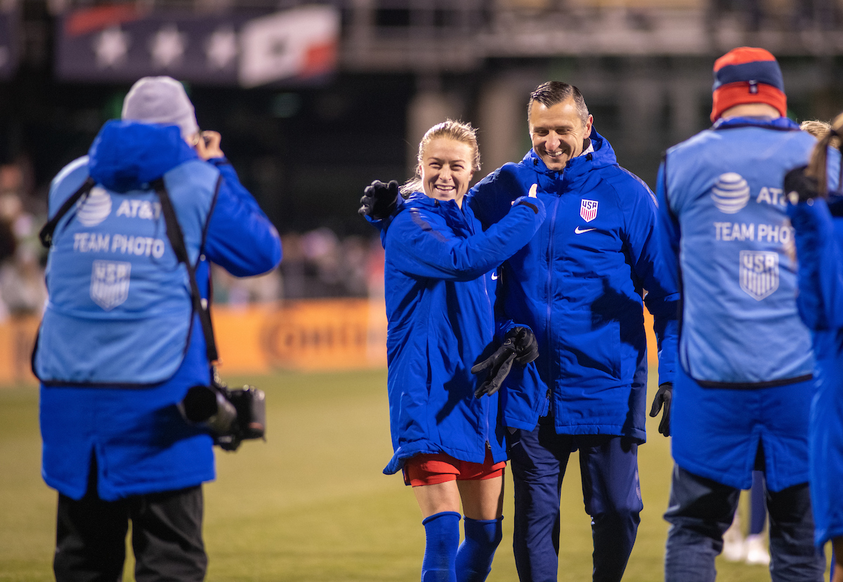 A USWNT player poses for a photo with head coach Andonovski during their Nov. 7 game in Columbus, Ohio. Photo by Ben Siegel