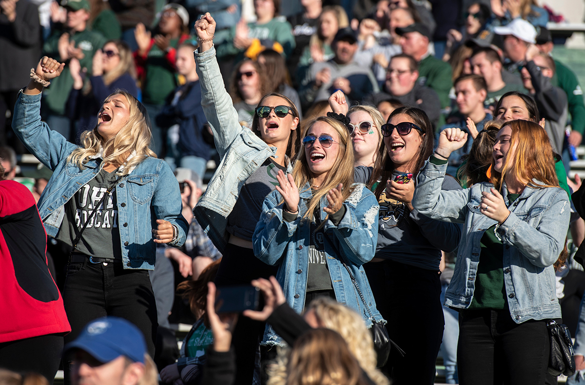 Fans cheer during Ohio University's Homecoming football game