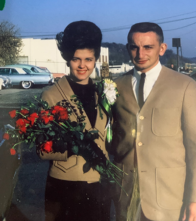 Joy and Bernard Kokenge, PHD ’66, pose for a photo before Ohio University’s Homecoming Parade in 1964—the year Joy was named Mrs. Ohio University.