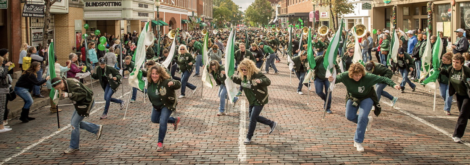 Marching 110 alumni performing in the Homecoming parade