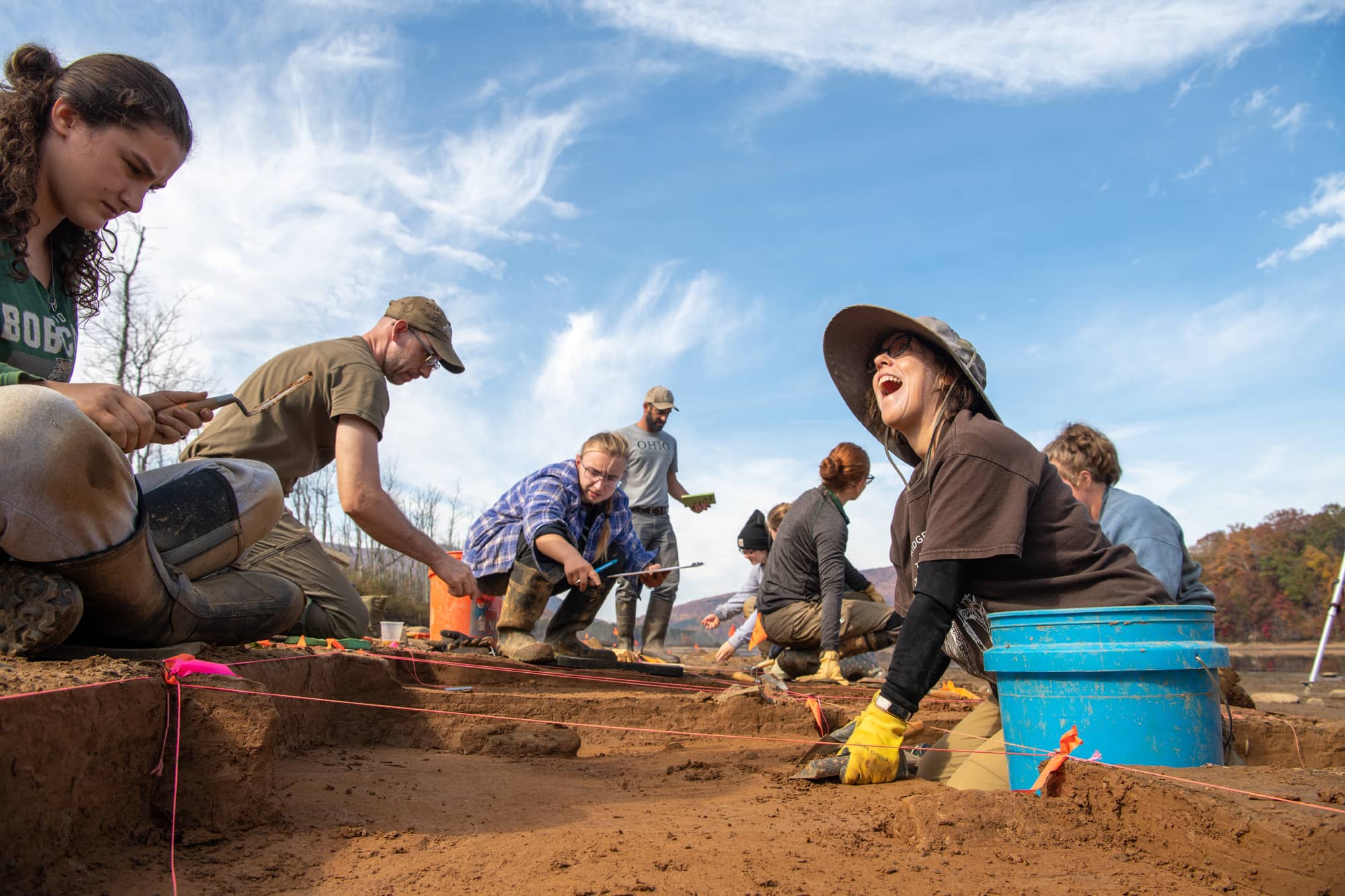 Archaeological Society of Virginia volunteers work alongside Ohio University students on an excavation site in Virginia.