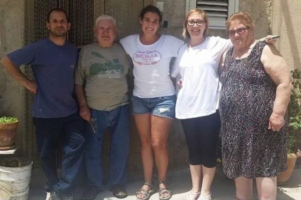 Breanna Oswald is shown with her relatives in Enna, Sicily