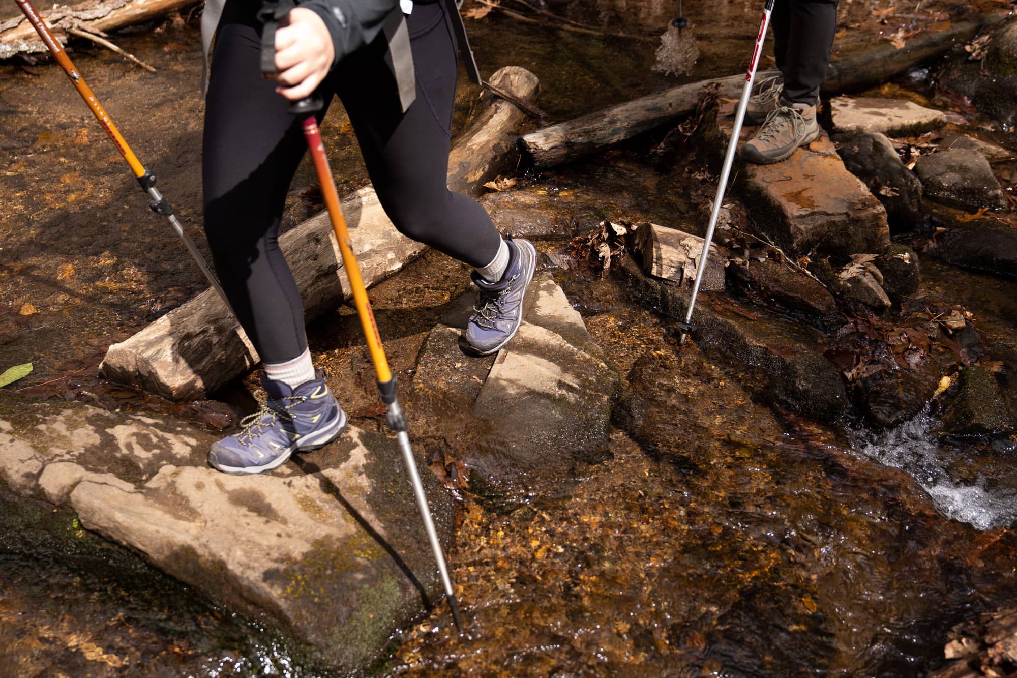 Ohio University students hike across a creek during their second day backpacking a section of the Appalachian Trail in the Nantahala National Forest on Sunday, March 6, 2022, near Franklin, North Carolina.