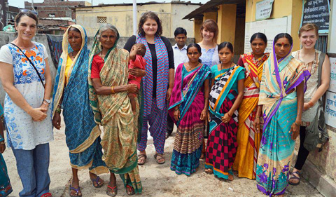 Grace Eberly with female healthcare workers in India