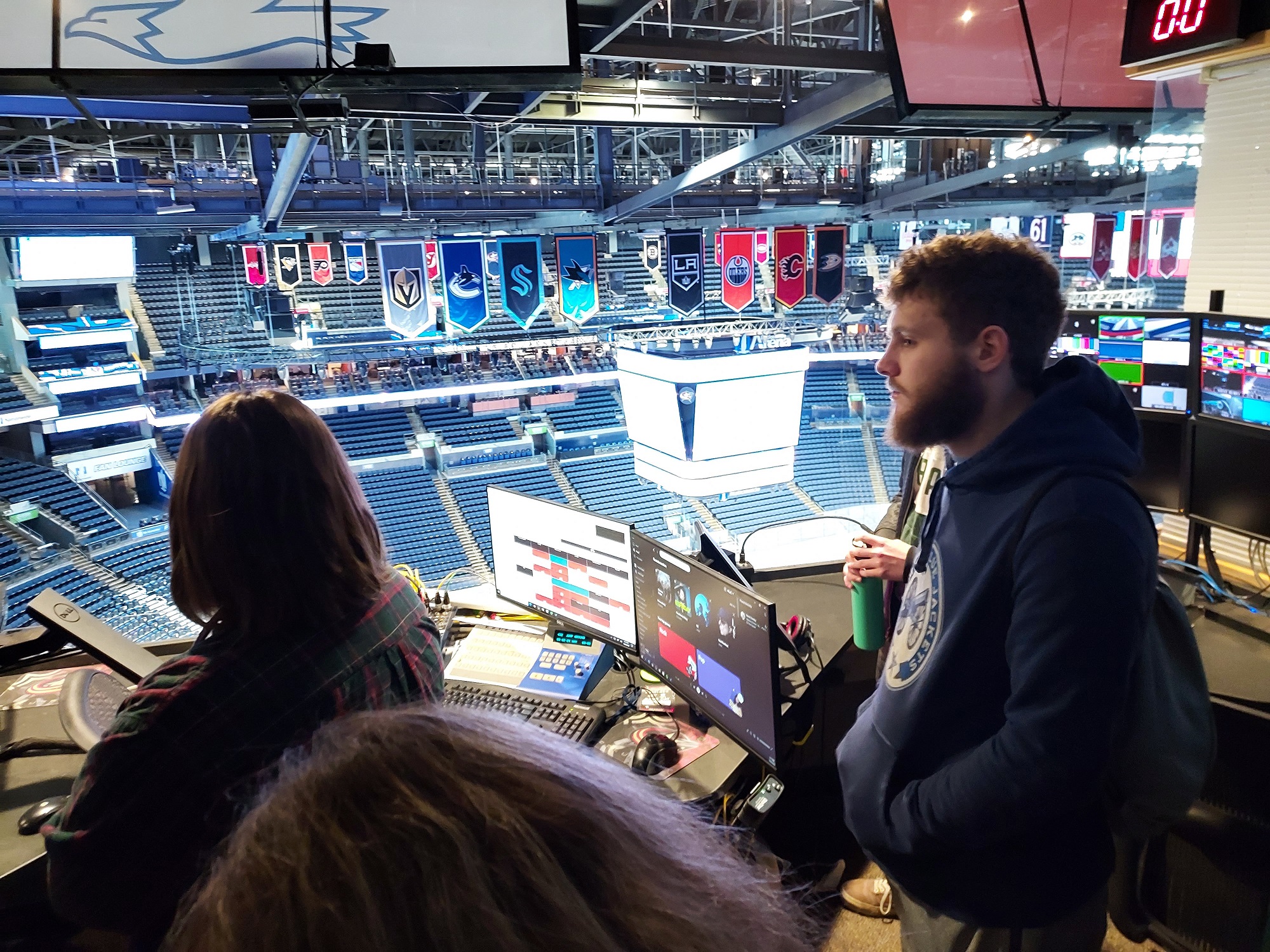 OHIO students are shown in the production booth for the Columbus Blue Jackets