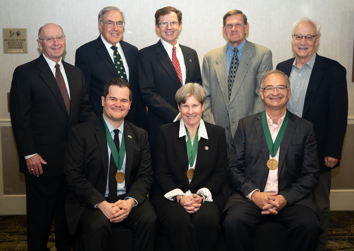 James Edwards, BSCH ’70, Chuck Stuckey, BSME ’66, HON ’15, Dick Dickerson, BSCE ’80, Jack Myslenski, BSIT ’73 and President Hugh Sherman. Front row, left to right: Jake Sigal, Angie Bukley and John Crum