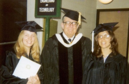 Dean John Wilhelm at 1976 graduation with Susan DeFord (BSJ’76) and Laura Landro (BSJ’76)