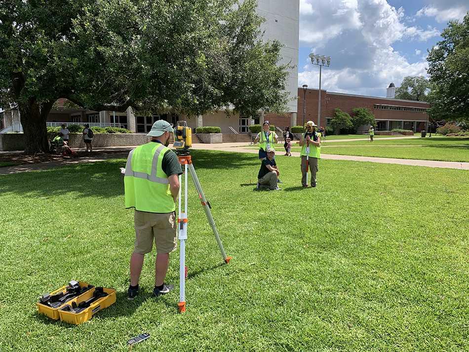 Surveying team competes in a competition.