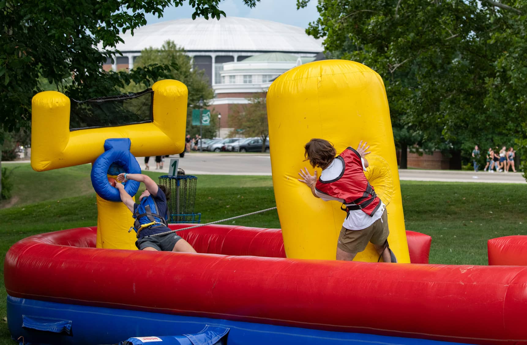 Students enjoy inflatable basketball at the Party at Ping.