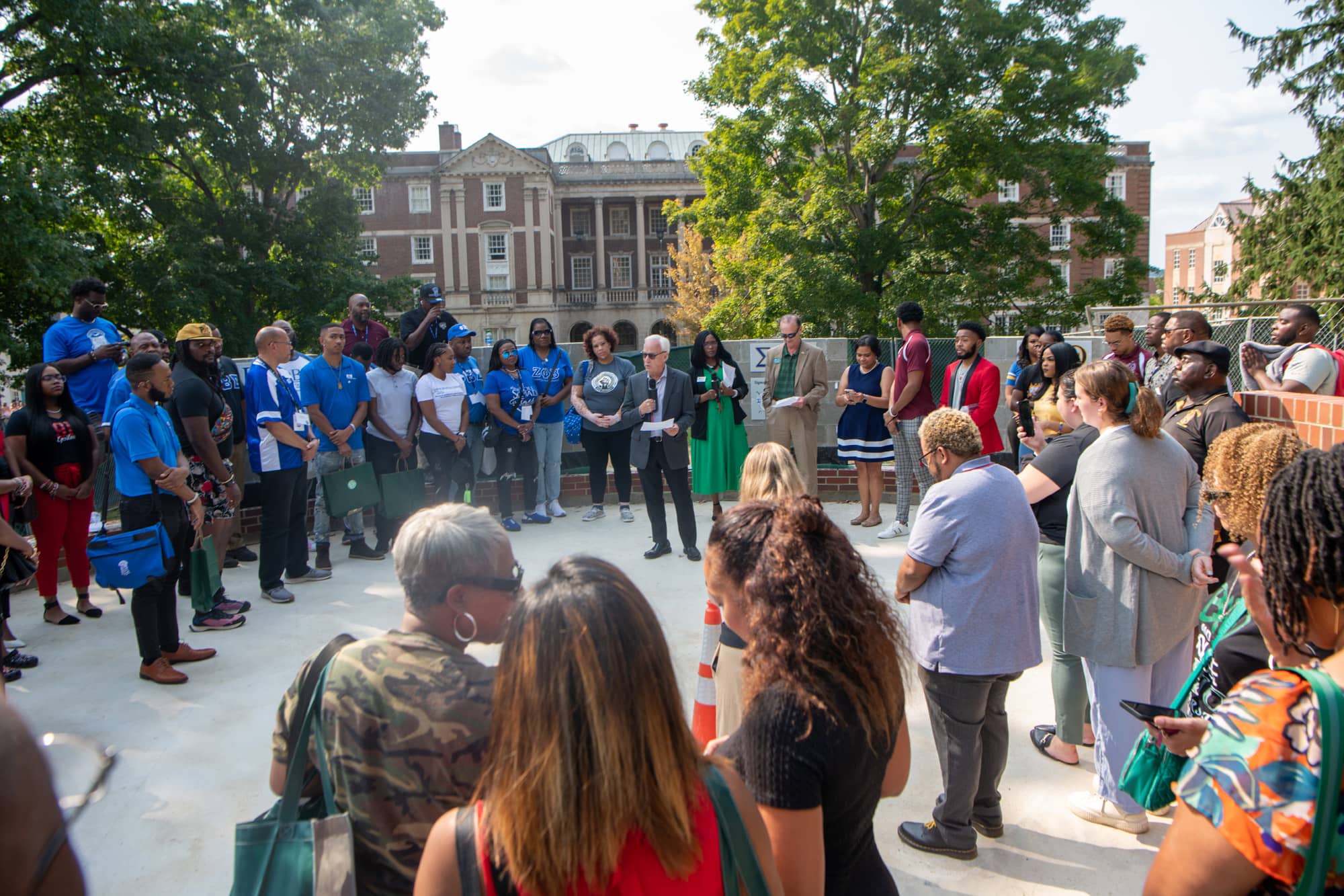 Ohio University President Hugh Sherman speaks to students and alumni at the dedication of the National Pan- Hellenic Council Plaza on College Green. 