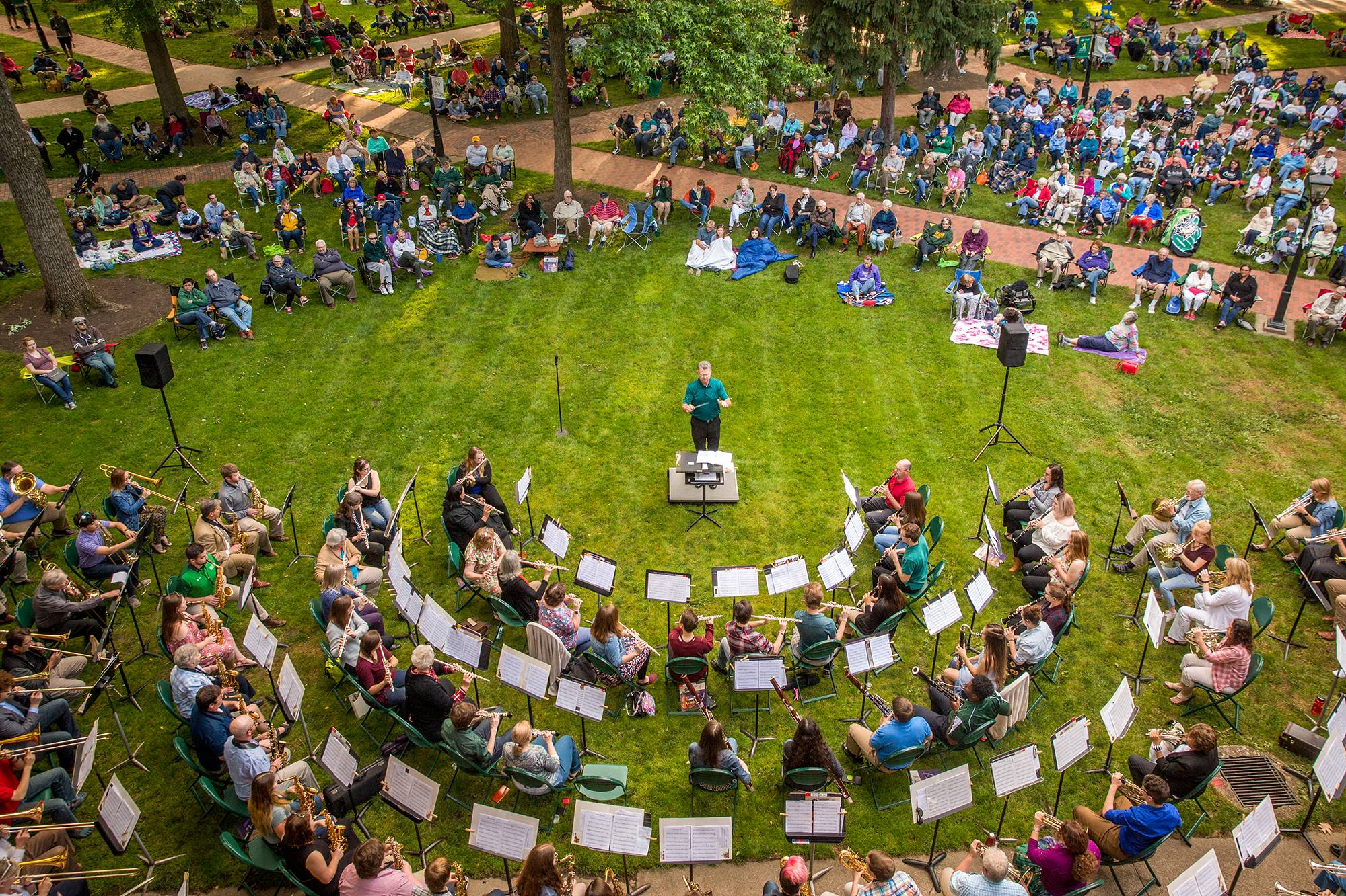 Members of the community band give free concerts every week at College Green during the summer.