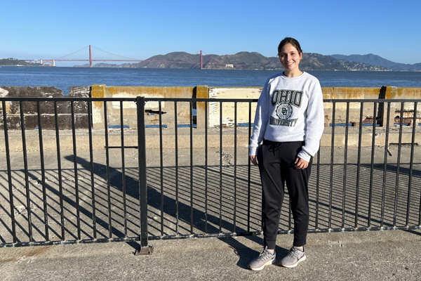 Taylor Vickers in the East Bay, with the Golden Gate Bridge in the background.