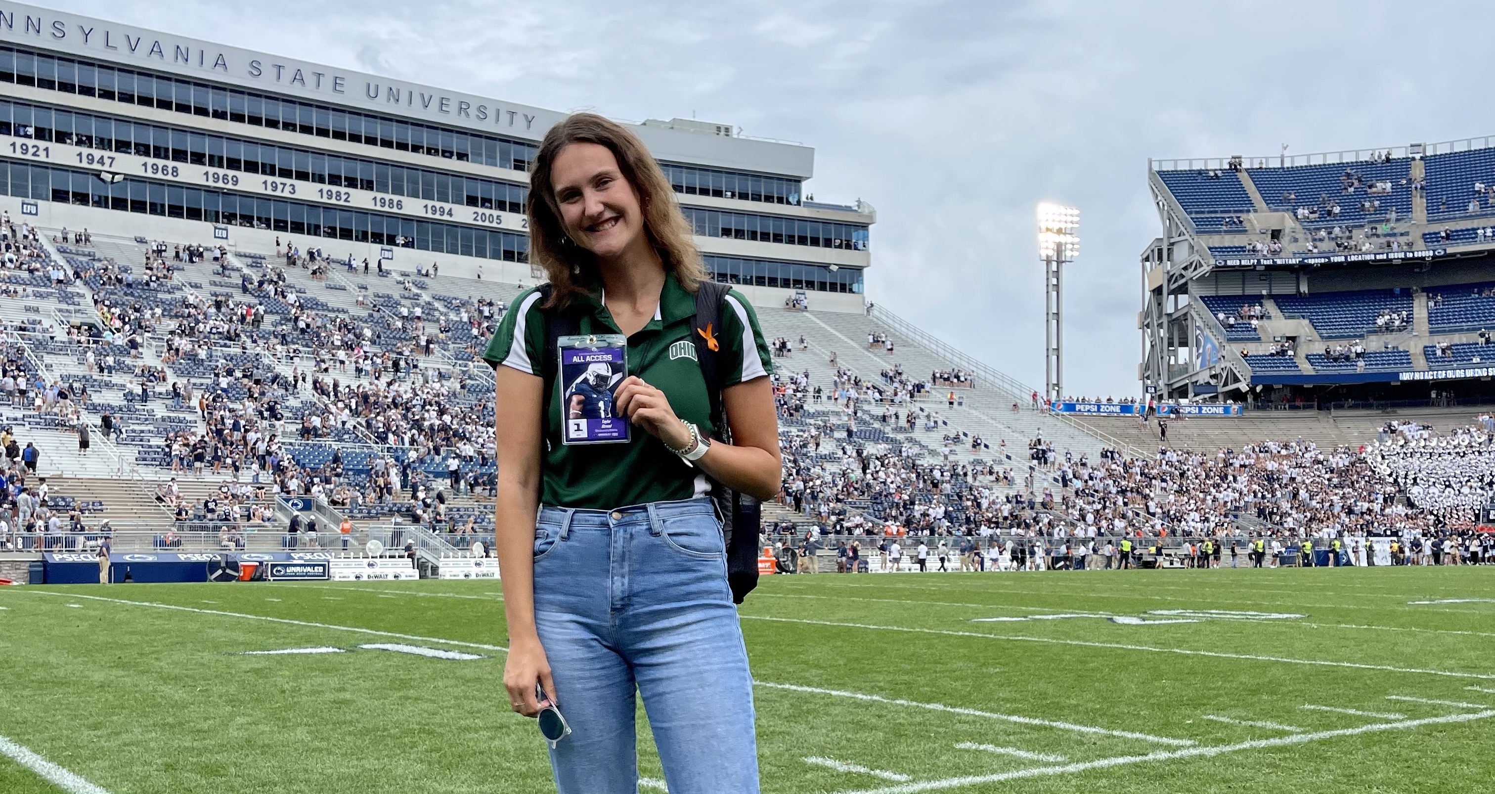 Graduate student Taylor Strnad attends an away game with the Ohio University football team. 