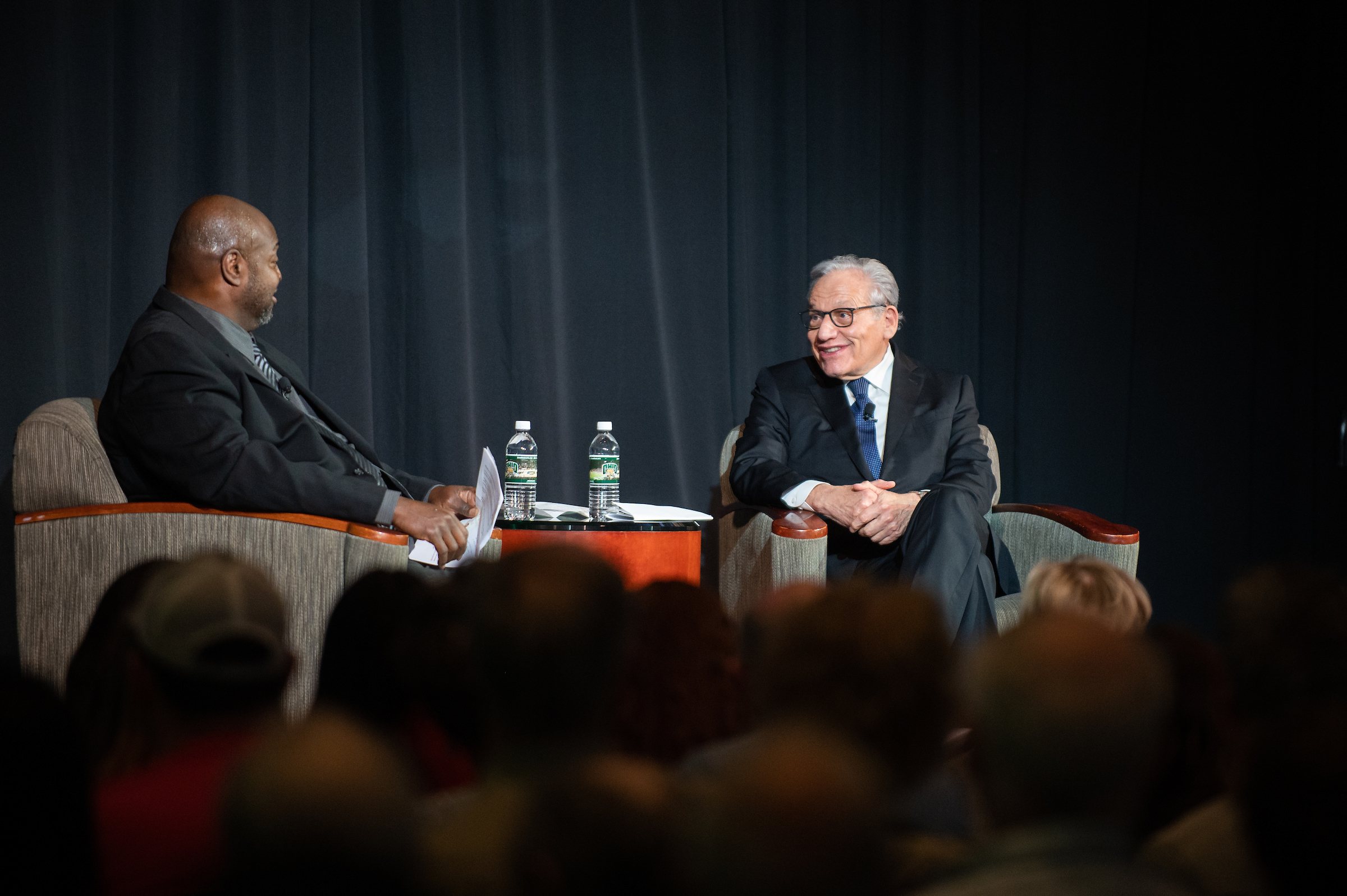Bob Woodward is shown on stage with moderator Mark Turner