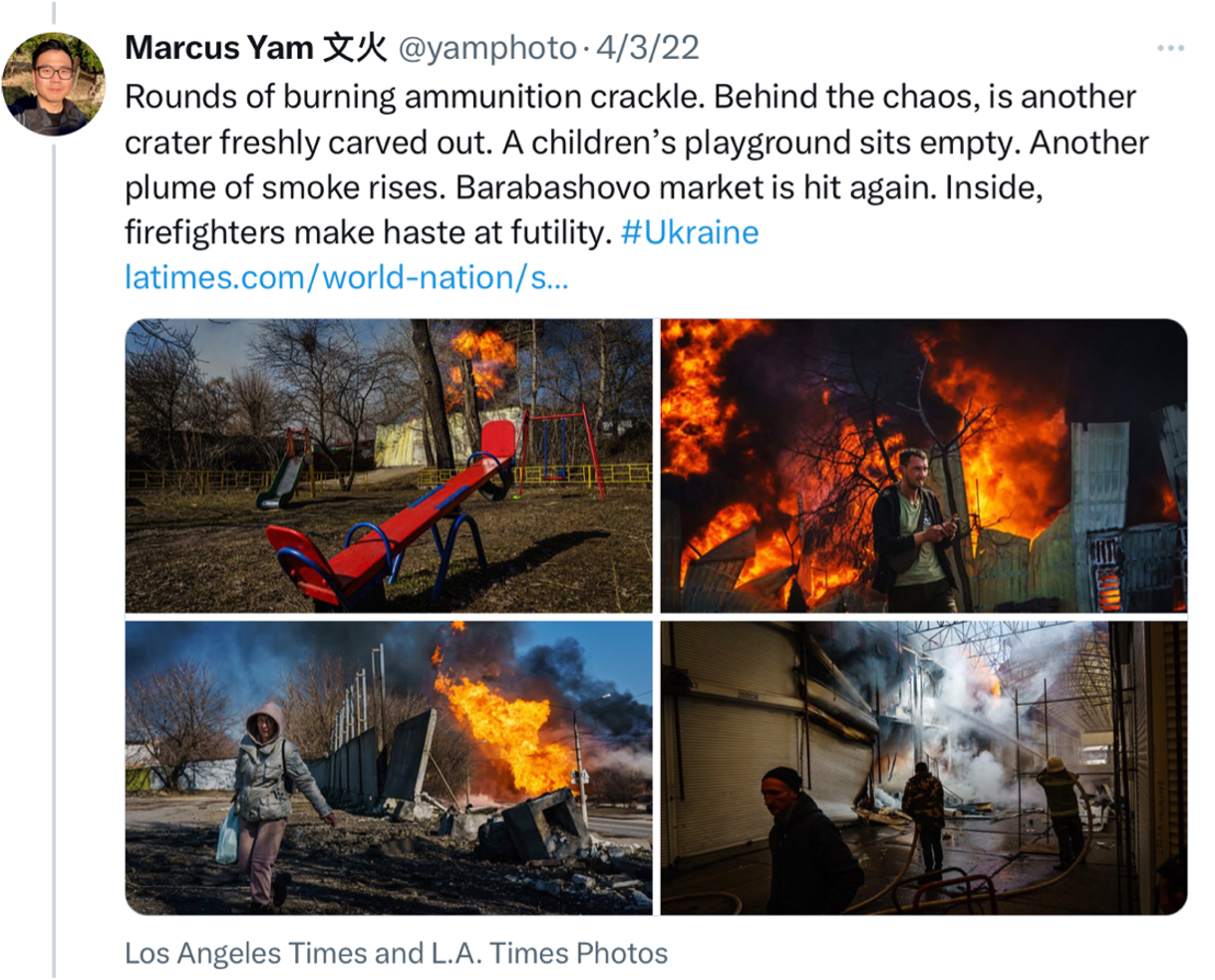 Screenshot of tweet from @yamphoto on 4/3/22 including photos featured in Los Angeles Times and L.A. Times Photos: Rounds of burning ammunition crackle. Behind the chaos, is another crater freshly carved out. A children's playground sits empty. Another plume of smoke rises. Barabashovo market is hit again. Inside, firefighters make haste at futility. #Ukraine