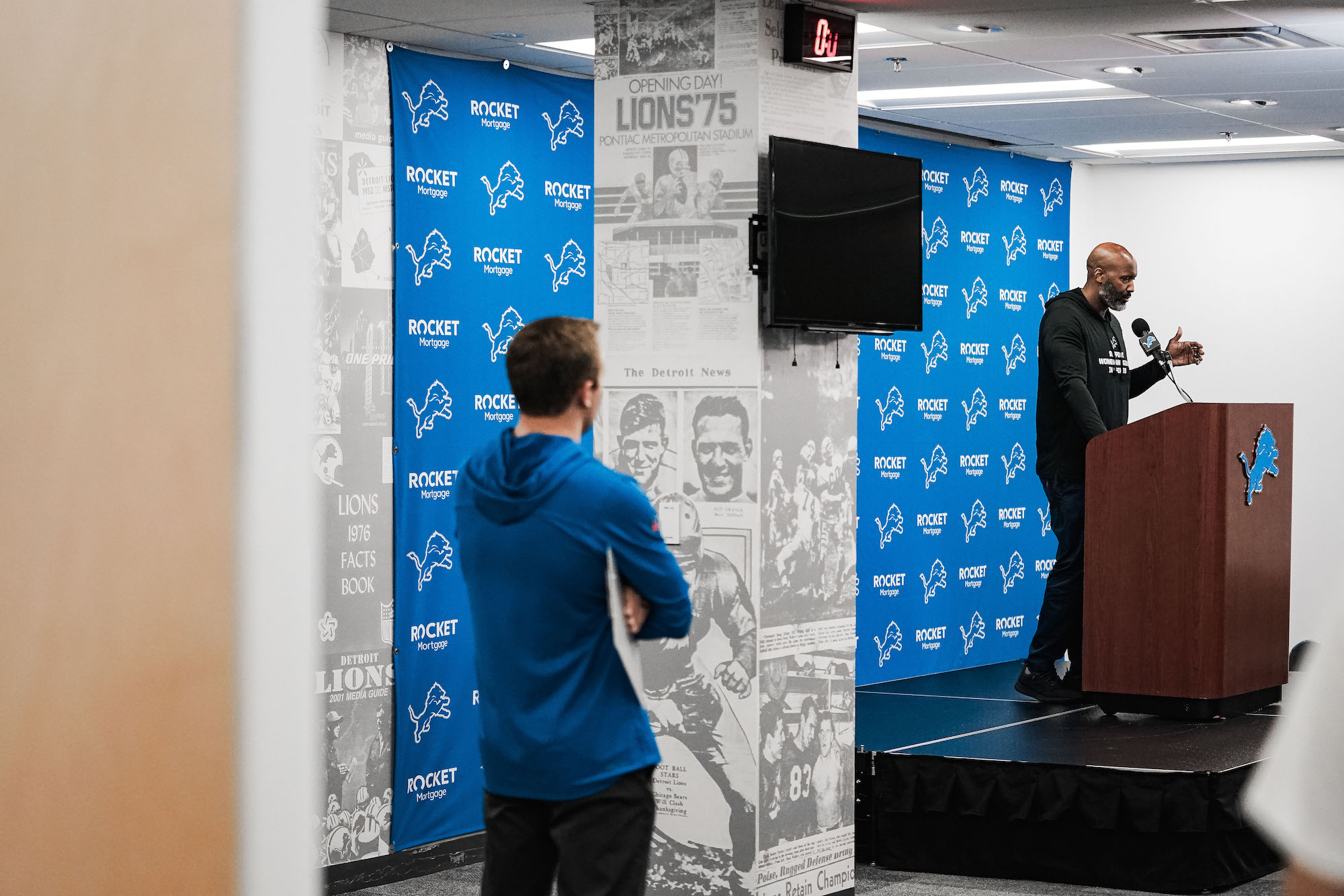 Eamonn Reynolds looks on as Detroit Lions General Manager Brad Holmes hosts a press conference.