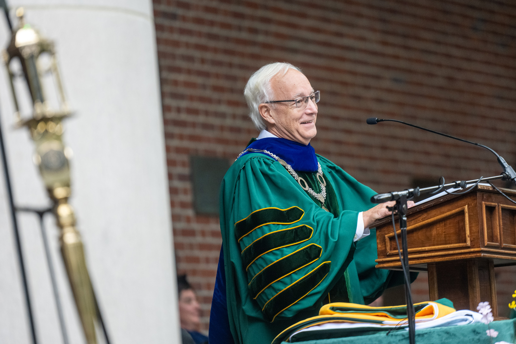 President Sherman at the podium during the 2020 rescheduled Commencement