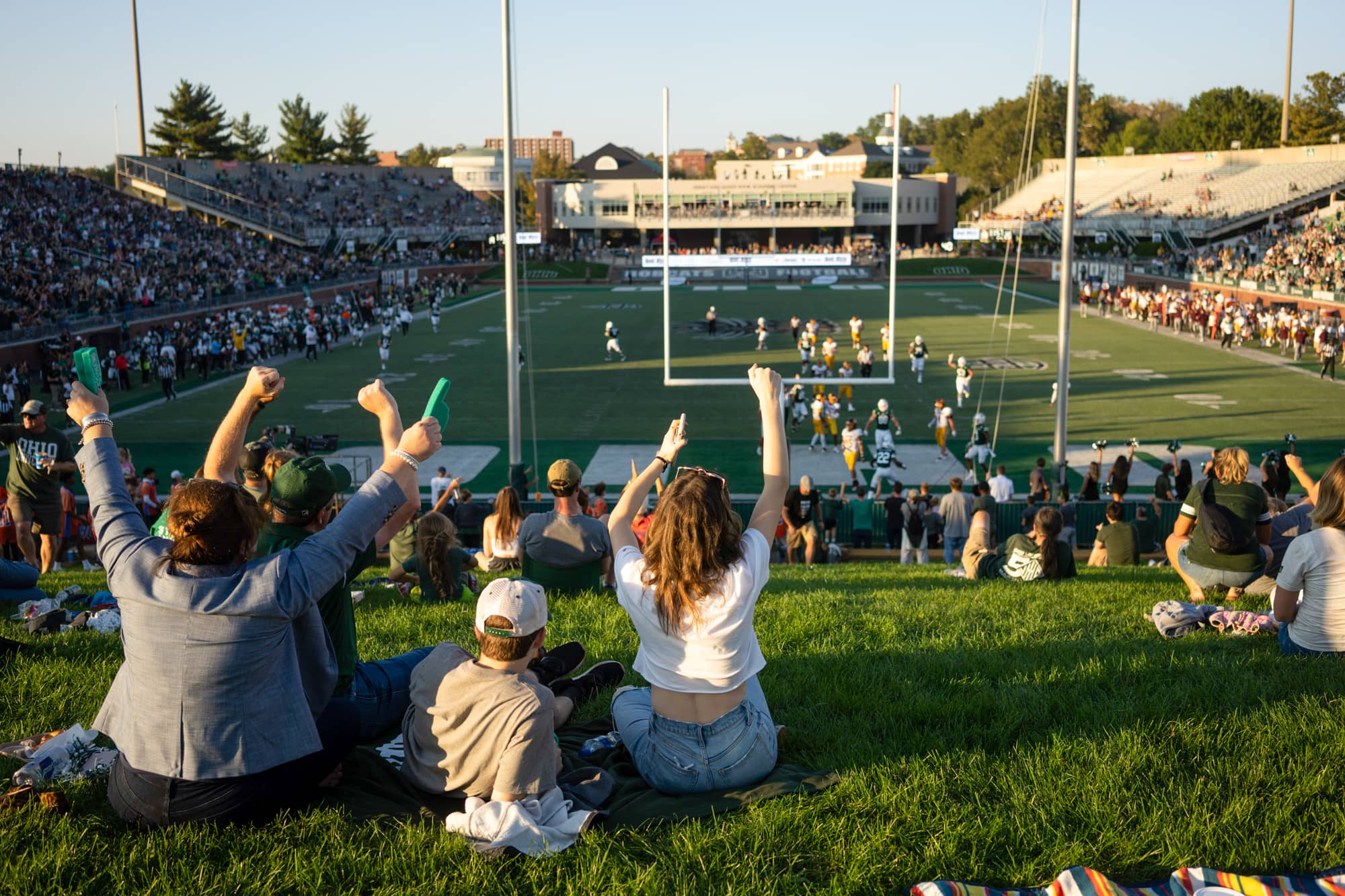Fans celebrate a play at the Homecoming Football games.