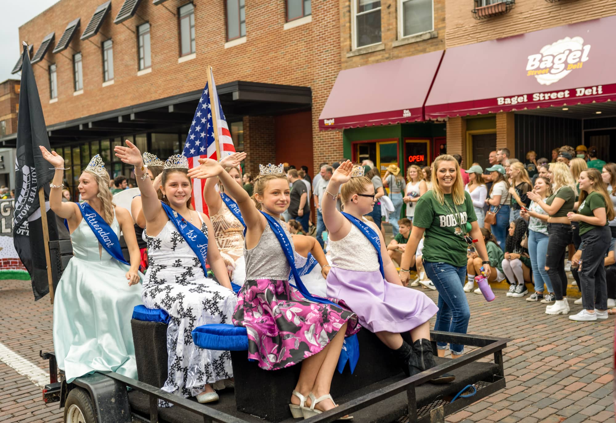 A community group participates in the Homecoming Parade