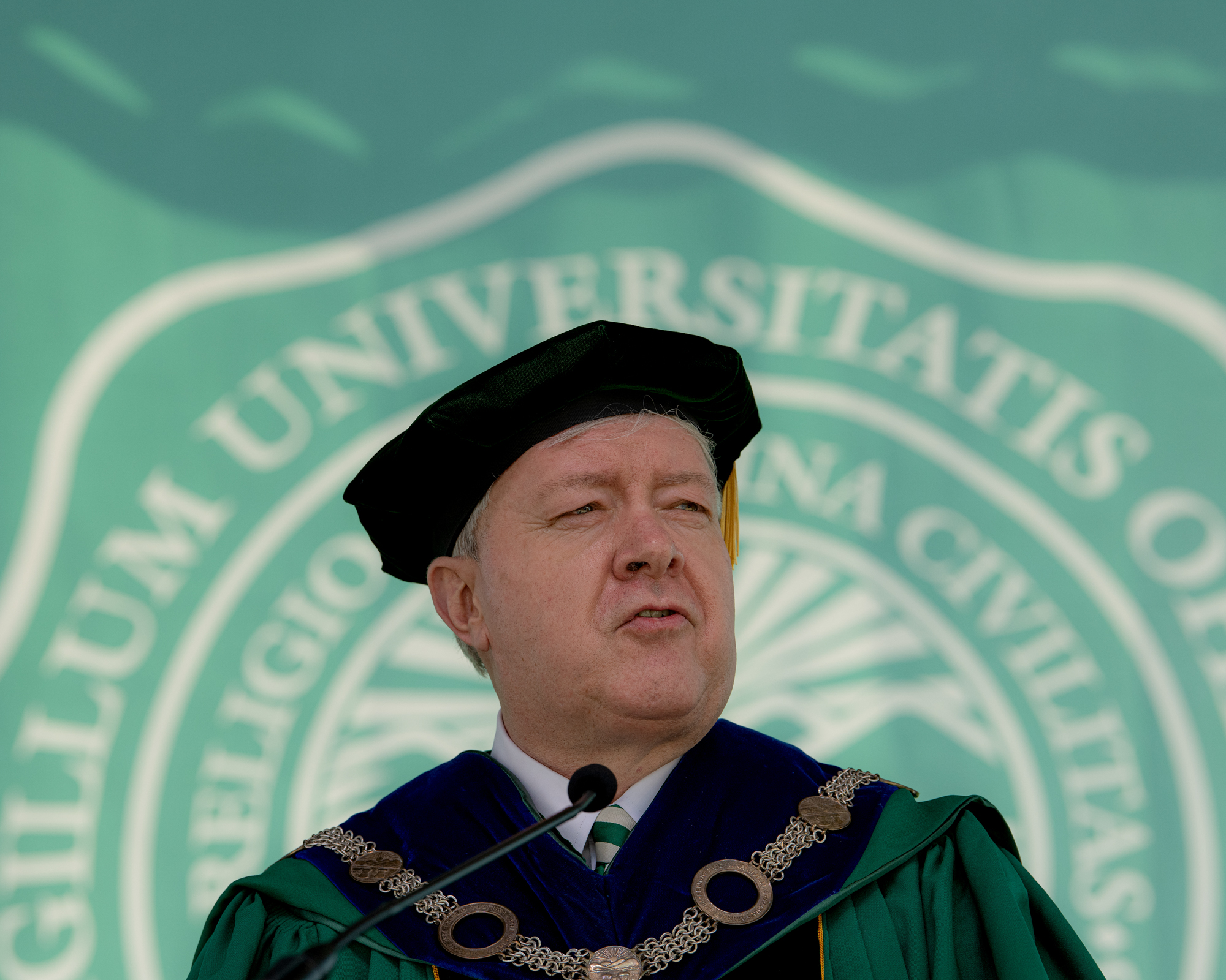 President Nellis delivering a commencement speech