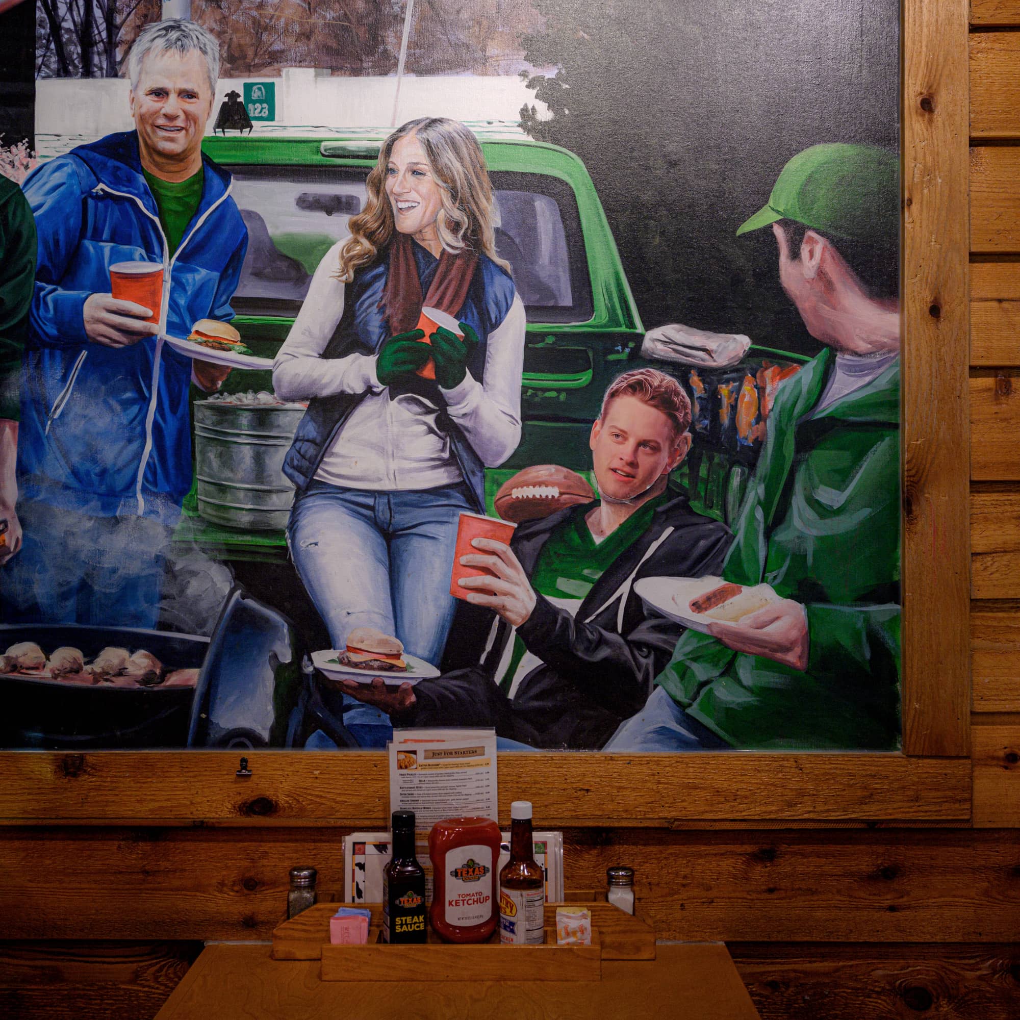 A mural at the Texas Roadhouse recognizing some of the famous people who have called Athens County home showcases an alteration that incorporates Joe Burrow into the cast of highlighted folks. Employees at the restaurant were not certain who modified the mural.
