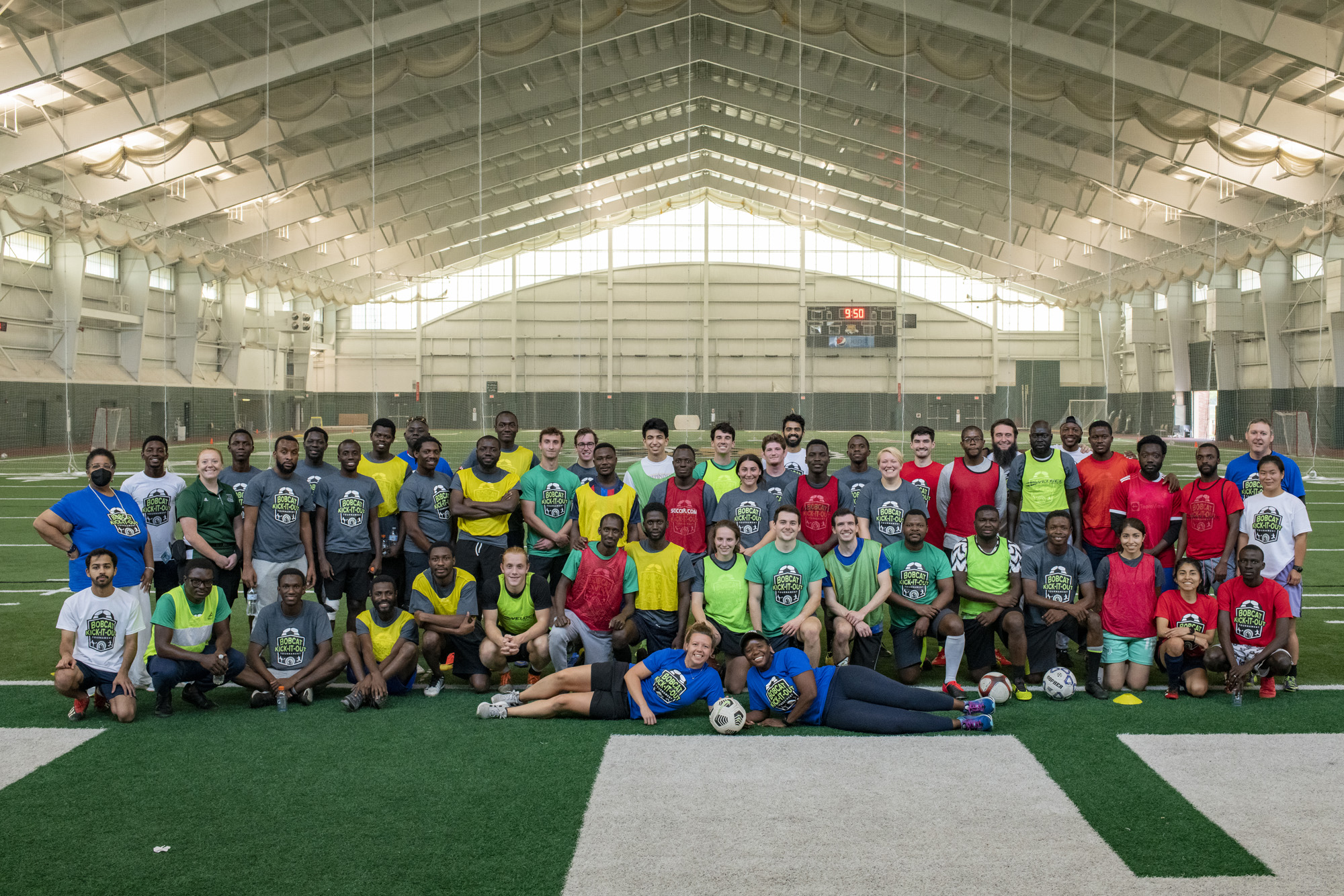 Soccer Tournament participants and supporters gather for a group photo.