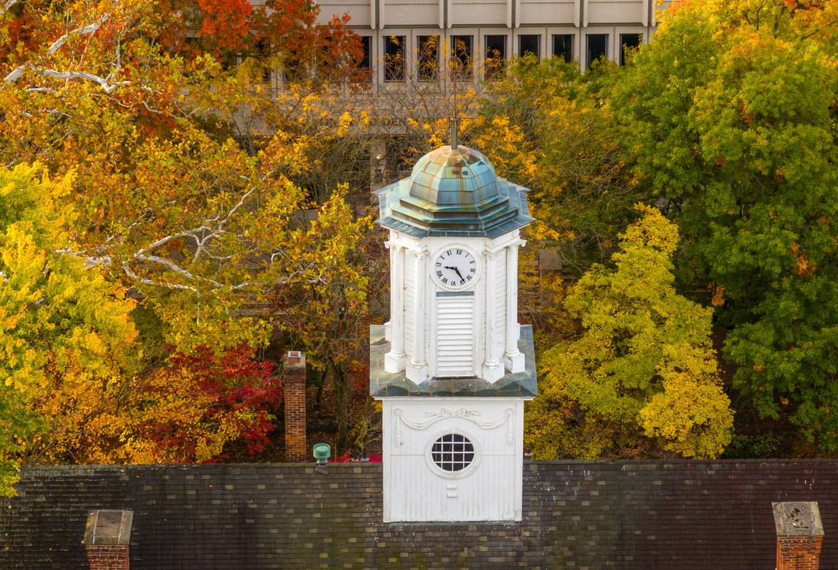 The cupola on Cutler Hall is surrounded by fall colors