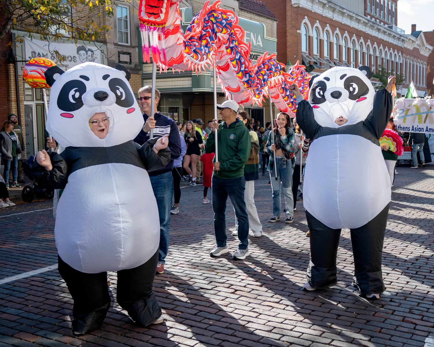 Athens Asian American community members participate in the Homecoming parade.