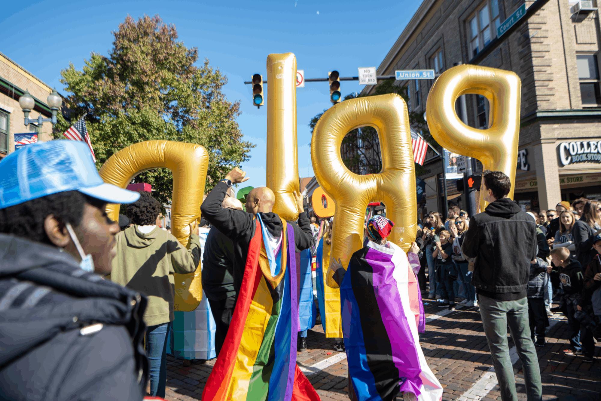 Staff and supporters of Ohio University’s LGBT Center show off their pride during the Homecoming Parade.