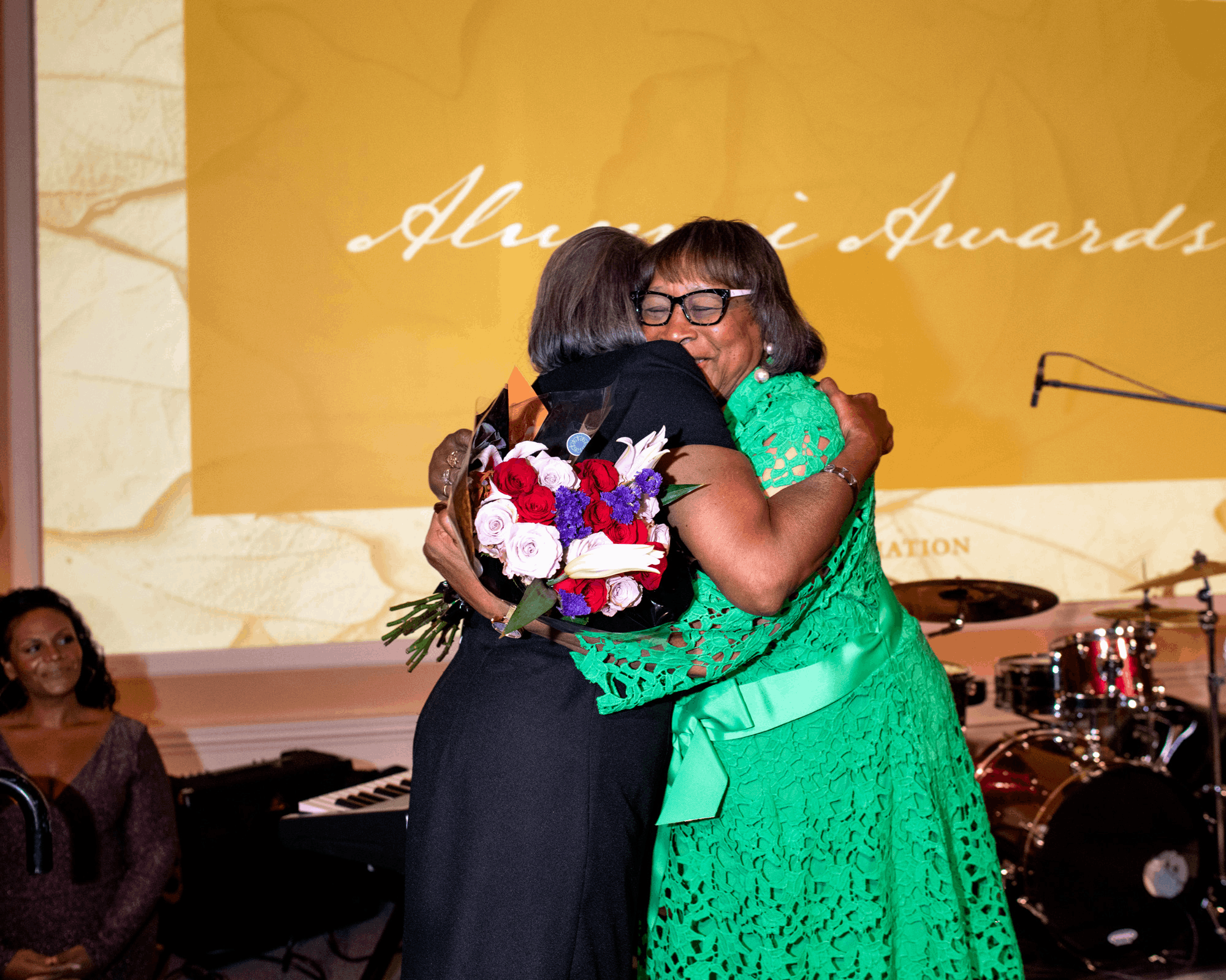 Dr. Patricia A. Ackerman, BA ’66, [RIGHT] embraces fellow Bobcat and friend Connie Lawson-Davis, BSED ’67. Dr. Ackerman was honored and celebrated as this year’s Alumna of the Year – the highest honored bestowed to an OHIO graduate – at Homecoming’s Alumni Awards Ceremony.