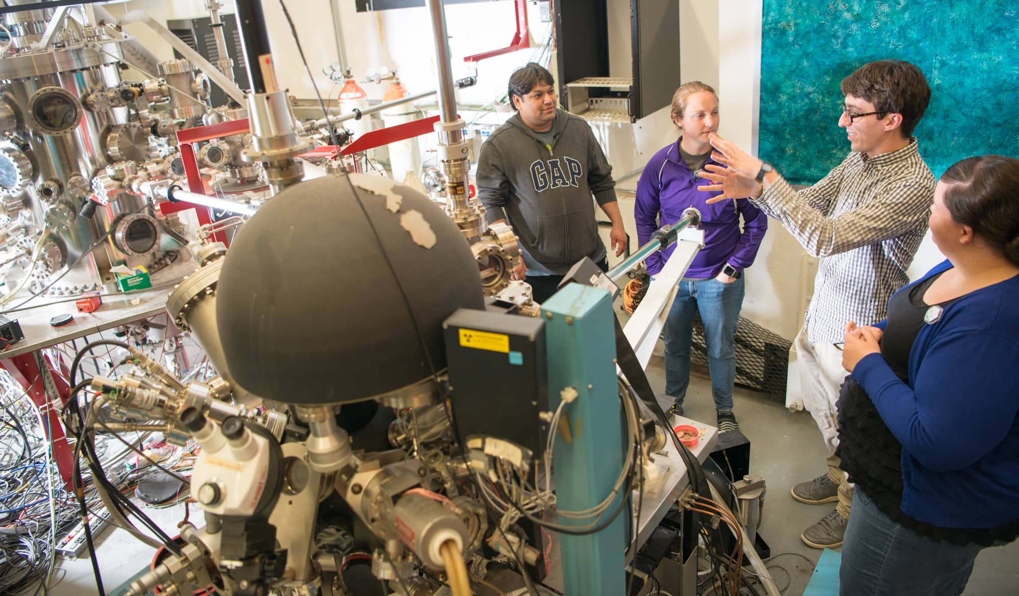 Zach Meisel, Ph.D, associate professor of Physics and Astronomy in the College of Arts and Sciences, instructs students at the Edwards Accelerator.