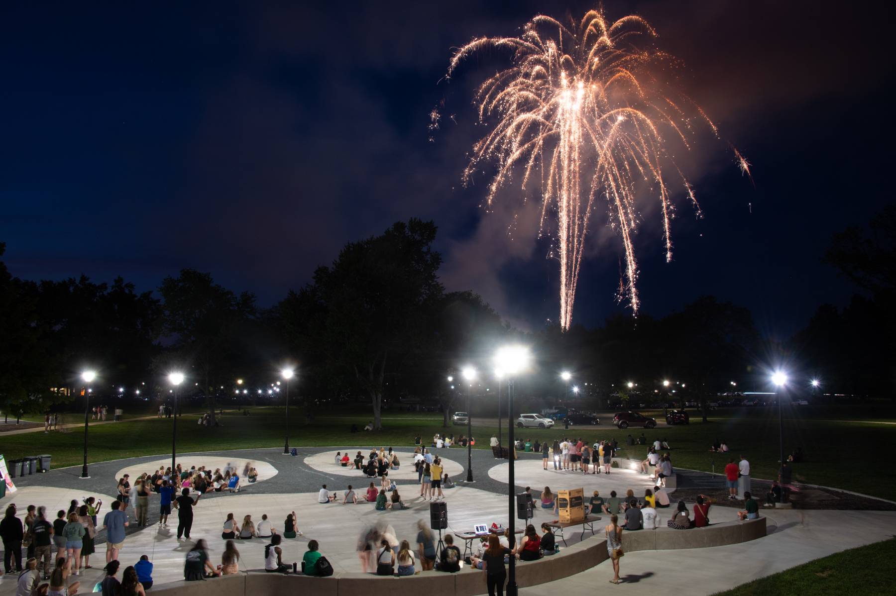 Students watch fireworks at Paw Print Park as part of the Bobcat Block Party