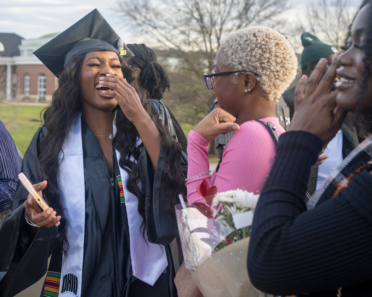 Graduates celebrate following the Fall 2023 commencement ceremony