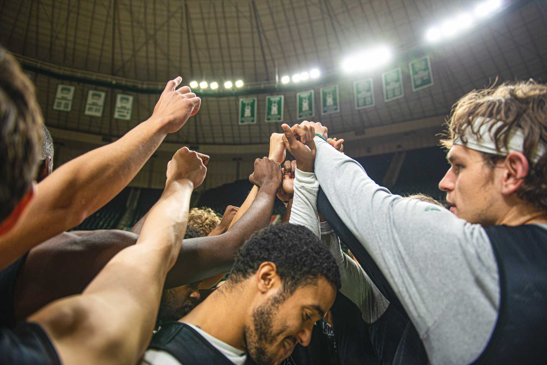 The OHIO Mens Basketball team huddles up before a game