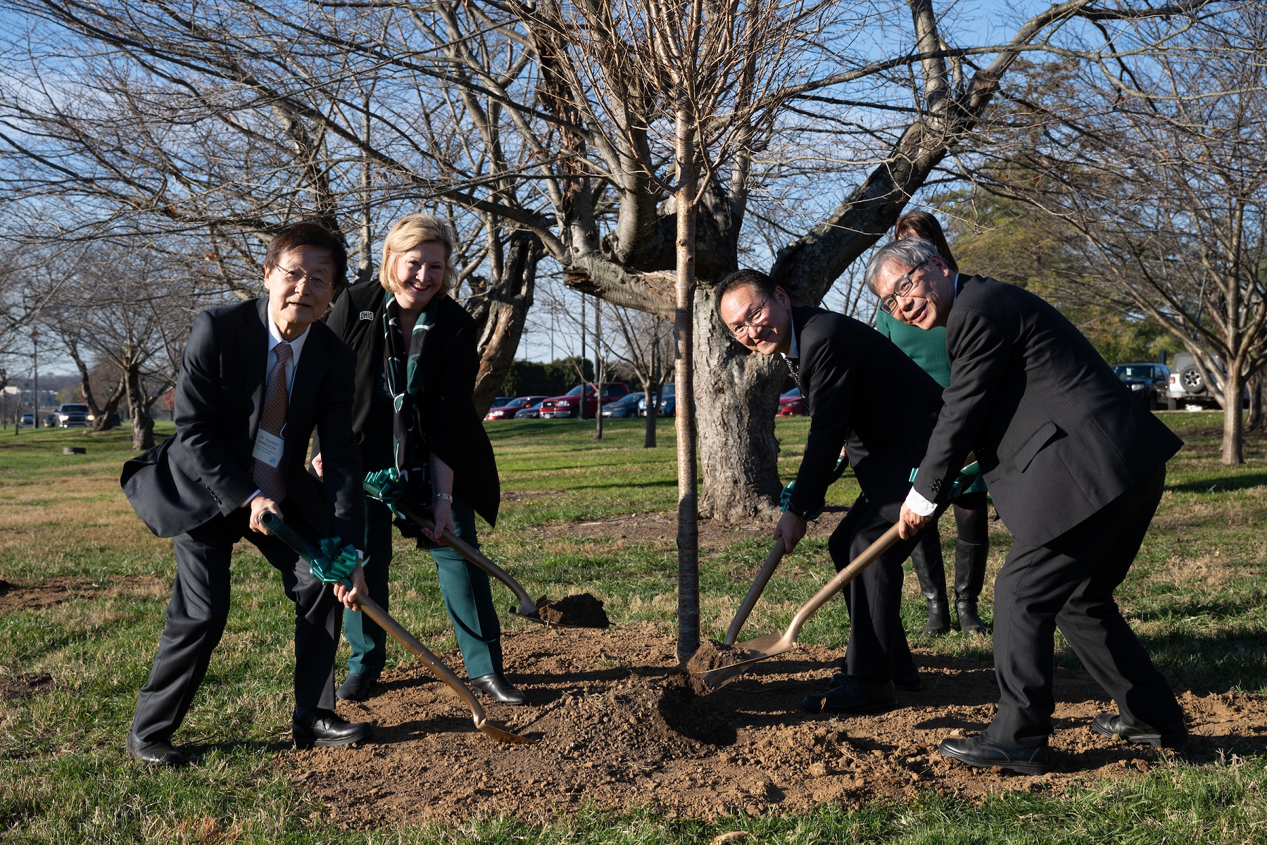 OHIO and Chubu University officials are shown at the ceremonial tree planting.