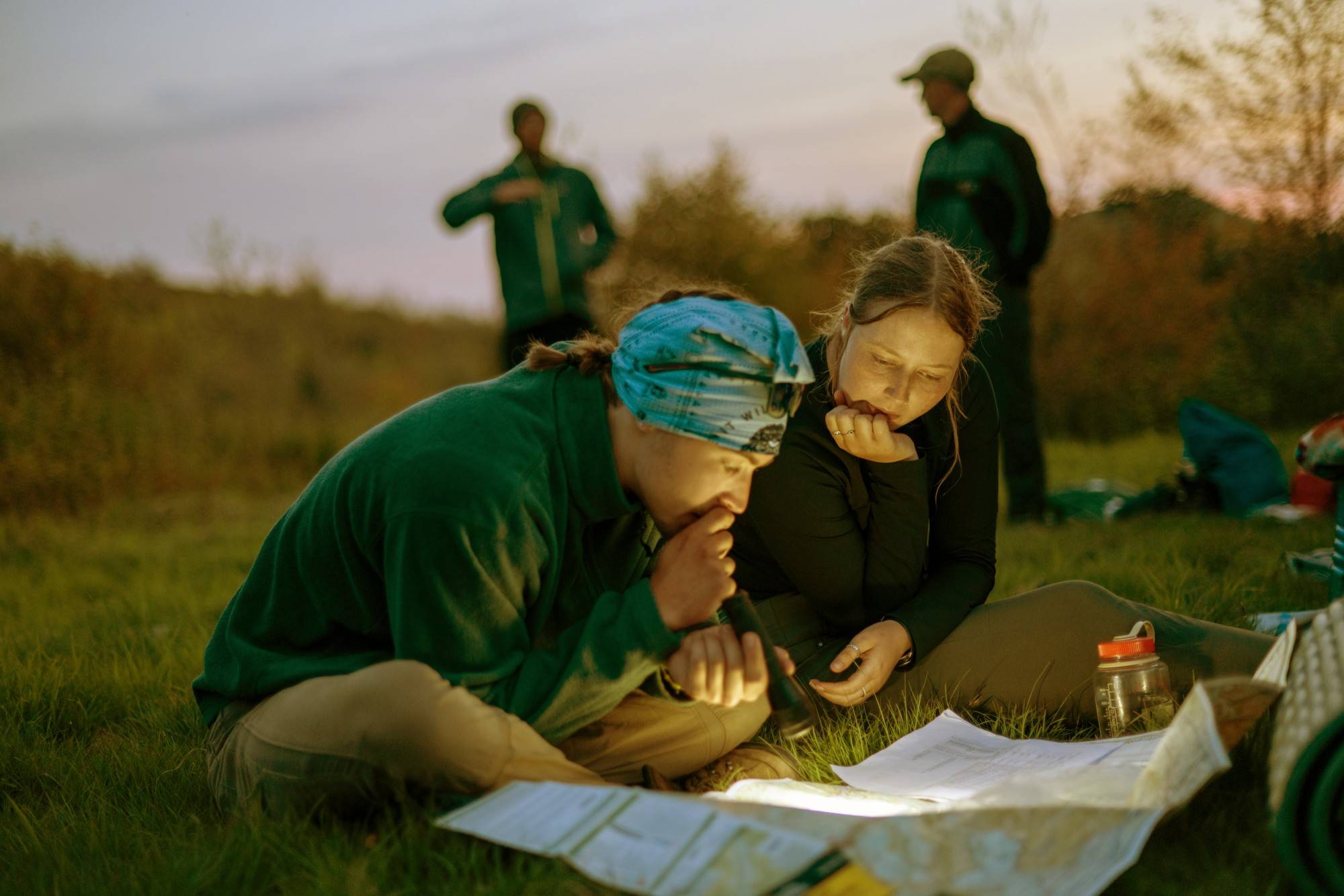 Garrison Beale (left) and Anna Hattemer discuss a plan for their turn leading the class. Every student takes turns leading the different days of the trip with minimal advance notice.