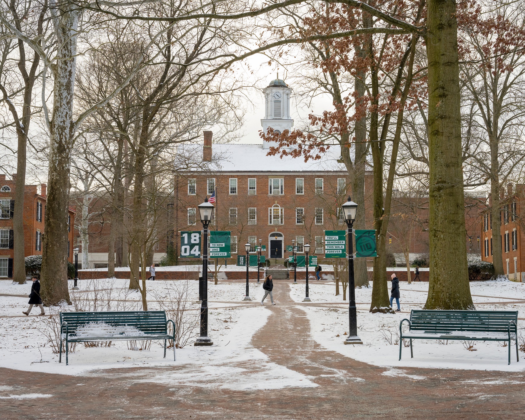The College Green is shown on a snowy, winter day