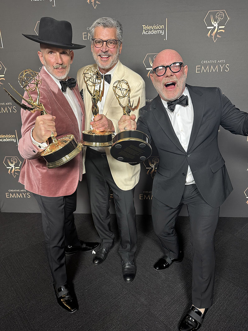 David Collins, BSC '89 (right) celebrates 'Queer Eye's' Jan. 7 Emmy win with Michael Williams (center), co-founder and executive producer, and Rob Eric (left), chief creative officer, all of Scout Productions.