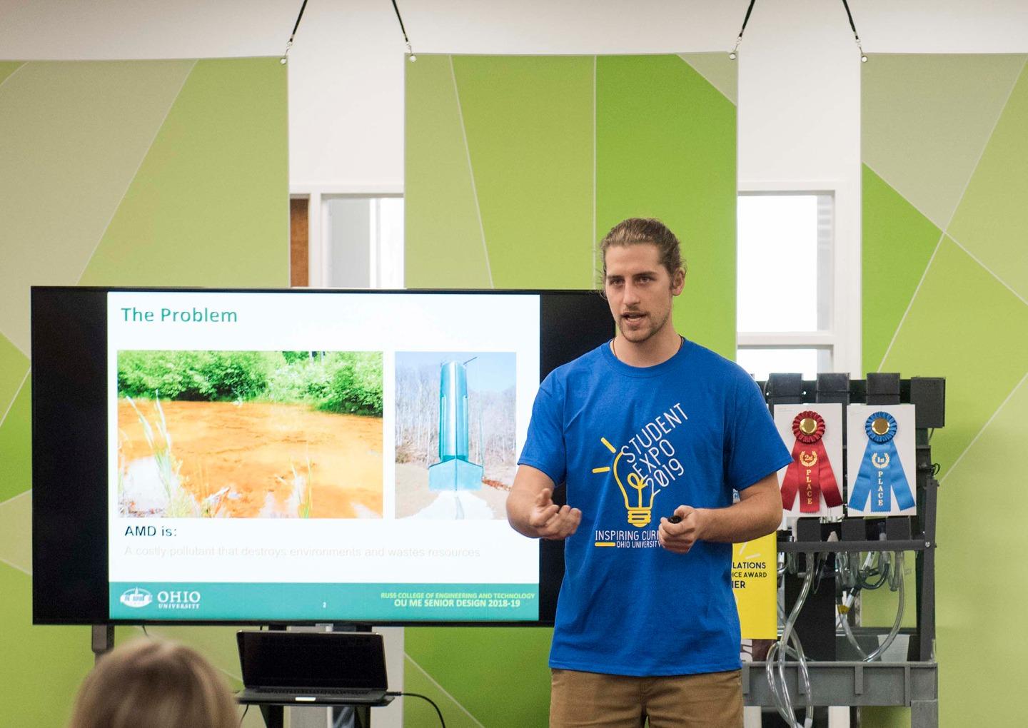 Drew Stroud, BSME ’19, presents his team’s work at the Center for Entrepreneurship’s 2019 Expo Pitch Competition, where students presenting work with commercial potential at the Student Expo pitch to a panel of judges for a chance to win cash. Photo by Alexandria Skowronski, BS, BSVC ’20