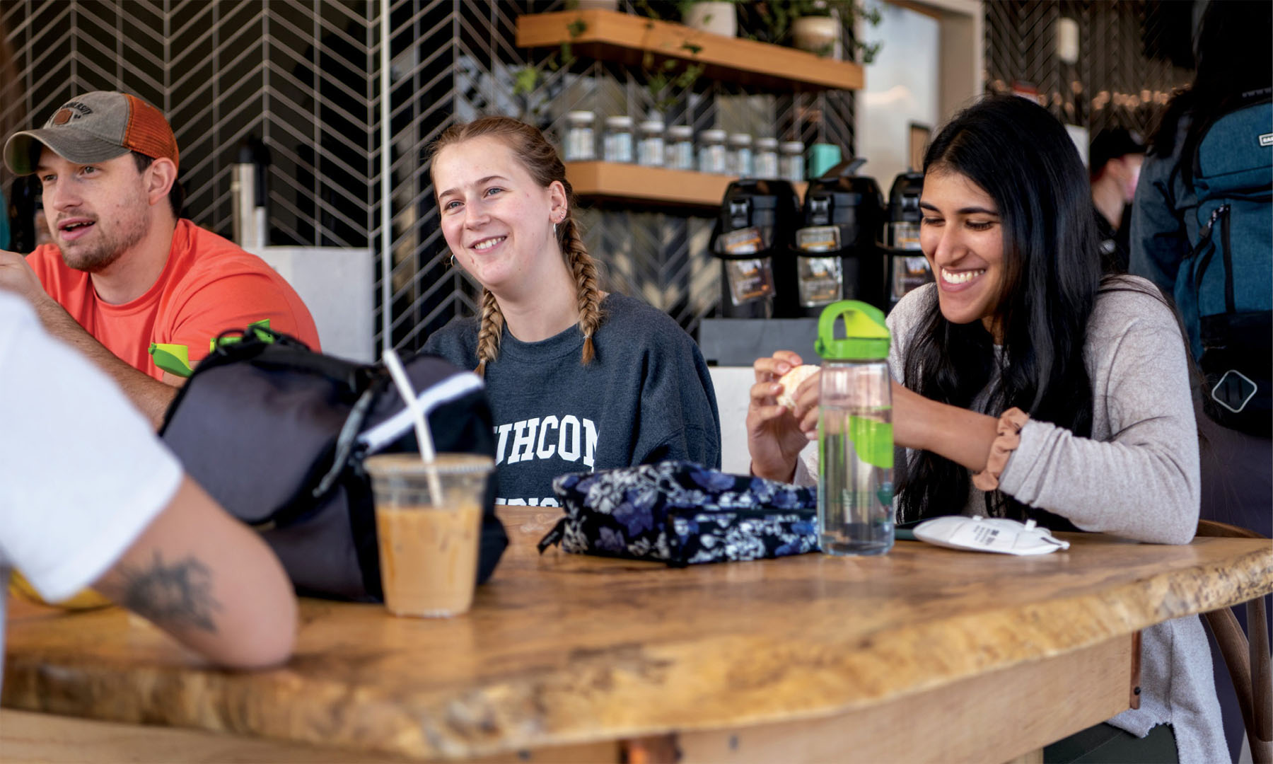 Students enjoy some food and fellowship at the Heritage College Society of Alumni & Friends Café at Factory Street, located on the first floor of Heritage Hall. Photo by Ben Wirtz Siegel, BSVC ’02