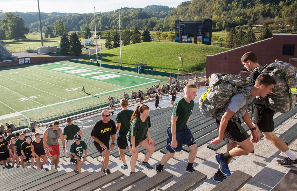 Army ROTC walking up Peden Stadium steps