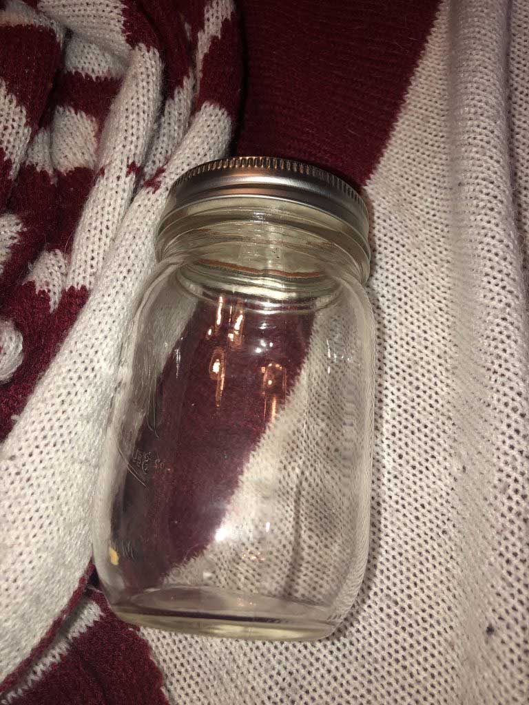 An emtpy glass jar