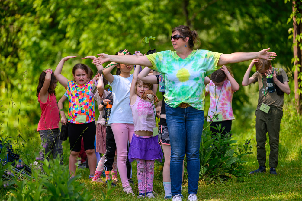 Campers going on a walk with a counselor