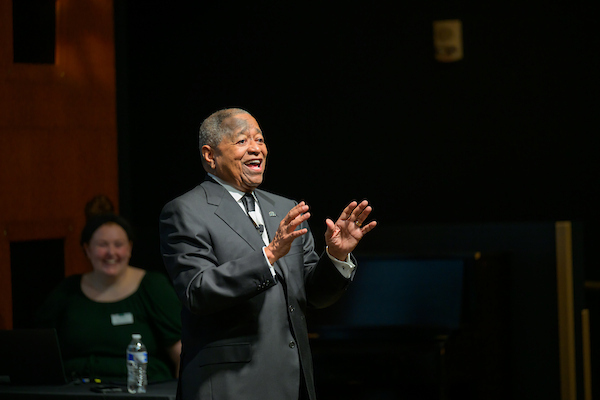 Dr. McDavis speaks to the crowd at the lecture