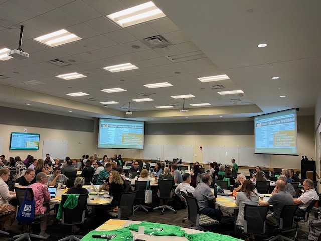 Group of people learning how to instruct learning communities. 