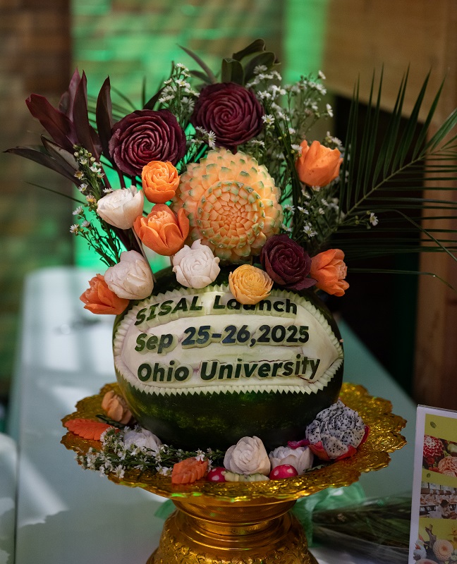 A basket with flowers and the words SISAL Launch Sep 25-26, 2025 Ohio University