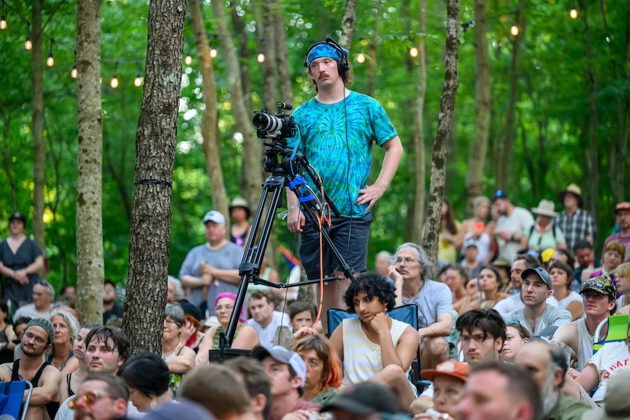 Student working behind camera