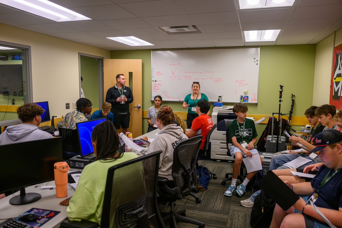 Students take notes during lecture