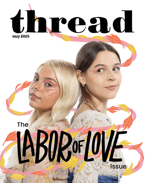 Two people standing back-to-back on a magazine cover.